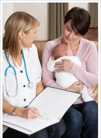 neonatal nurse with baby