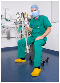 anesthetist with anesthetic machine